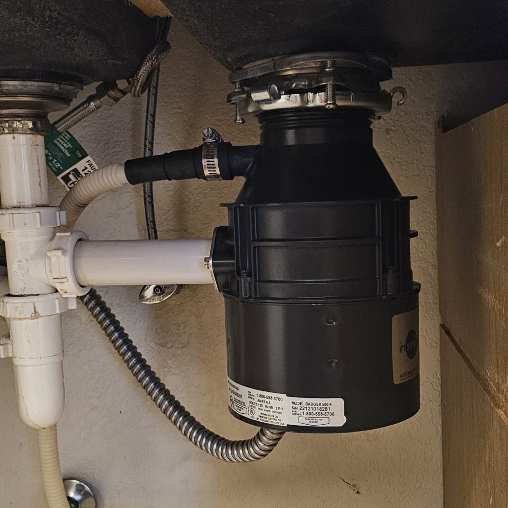 a black and white pipe with white pipes