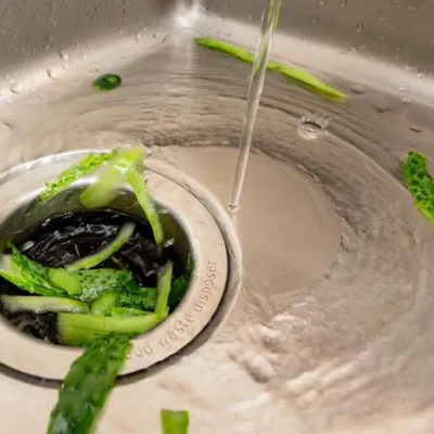 a water running over a sink